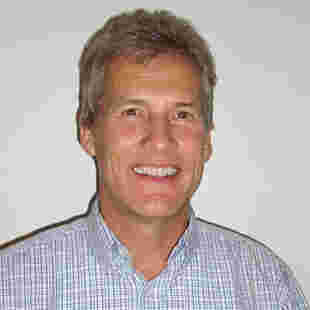 Dr Tim Ewer